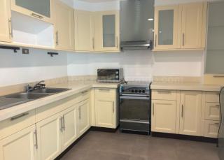 Kitchen area of 2-bedroom condo unit at Bonifacio Ridge