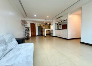 Living and dining areas of 2-bedroom condo unit at Bonifacio Ridge