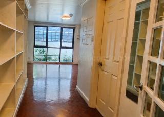 Corridor of 3-bedroom bi-level condo unit at The Regency at Salcedo