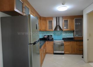 Kitchen area of 2-bedroom condo unit at Bonifacio Ridge