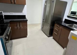 Kitchen area of 3-bedroom condo unit at Two Serendra The Red Oak Tower
