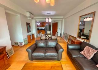 Living and dining areas of 2-bedroom condo unit at Bonifacio Ridge