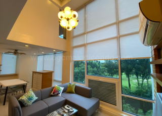 High ceiling living area of two bedroom condominium unit at Bellagio tower 2