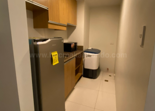 Kitchen area of 1-bedroom condo unit at Central Park West