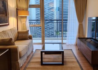 Living area of 1-bedroom condo unit at Verve Residences