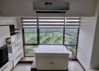 Floor-to-ceiling windows at living area of two bedroom condominium unit at Bellagio tower 3
