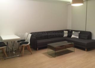 Dining and living areas of 1-bedroom condo unit at One Shangri-La Place, Shang Central