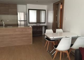 Kitchen and dining areas of 1-bedroom condo unit at One Shangri-La Place, Shang Central