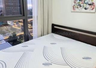 Bedroom of 2-bedroom condo unit at Uptown Ritz Residences