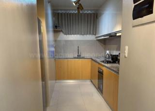 Kitchen area of 2-bedroom condo unit at Uptown Ritz Residences