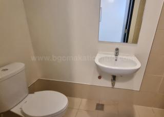 Utility toilet and bath of 2-bedroom condo unit at West Gallery Place