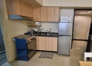 Kitchen area of 1-bedroom condo unit at Avida Towers Turf tower 1