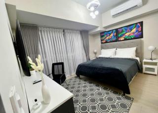 Master's bedroom of 2-bedroom condo unit at Uptown Parksuites tower 2