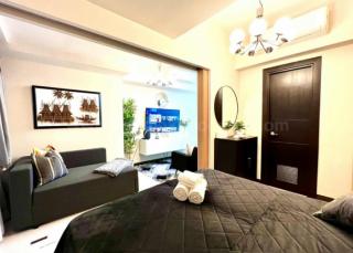 Bedroom of 1-bedroom condo unit at Uptown Parksuites tower 1