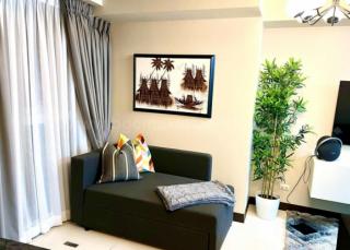 Living area of 1-bedroom condo unit at Uptown Parksuites tower 1