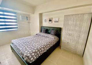 Bedroom of 1-bedroom condo unit at Avida Towers Turf tower 2