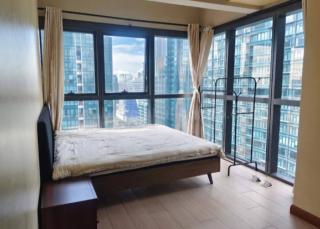 Bedroom 1 of 2-bedroom condo unit at Uptown Ritz Residences