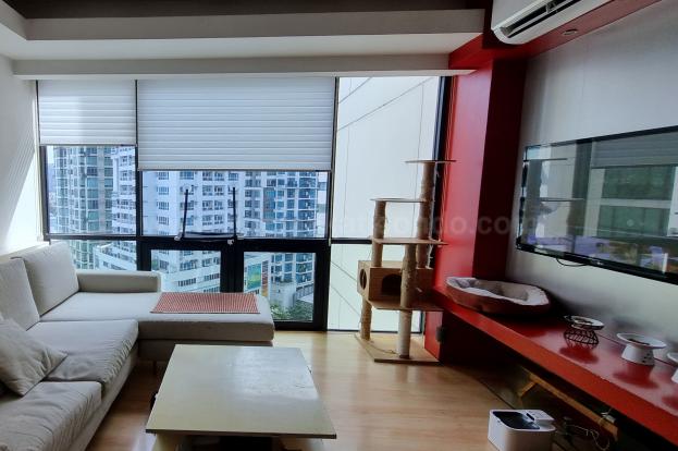Living area of 2-bedroom condo unit at Bonifacio Ridge