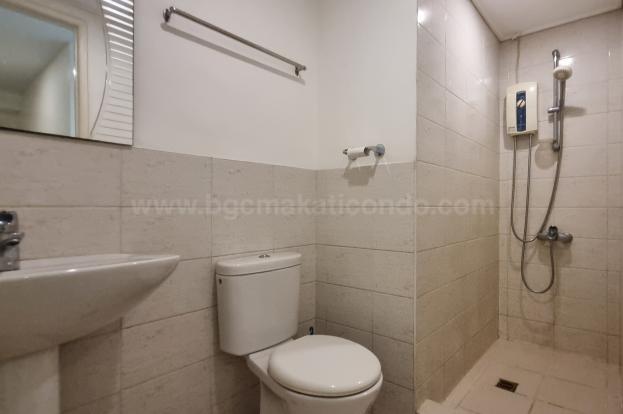 Common toilet and bath of 2-bedroom condo unit at Bonifacio Ridge