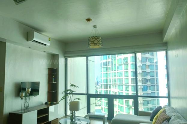 Living area of 2-bedroom condo unit at Bonifacio Ridge