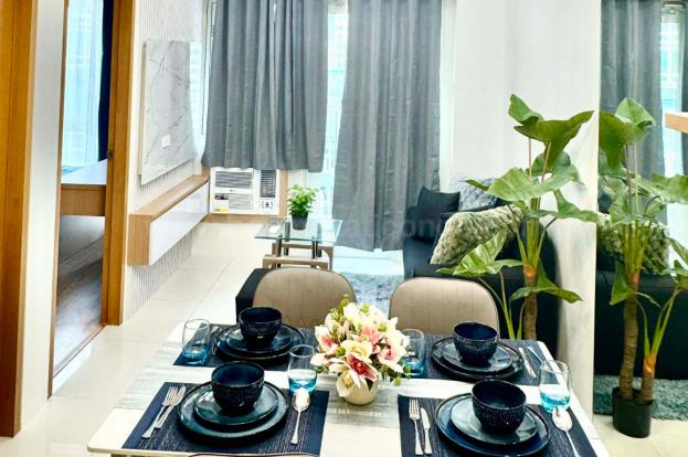 Dining and living areas of 1-bedroom condo unit at Times Square West