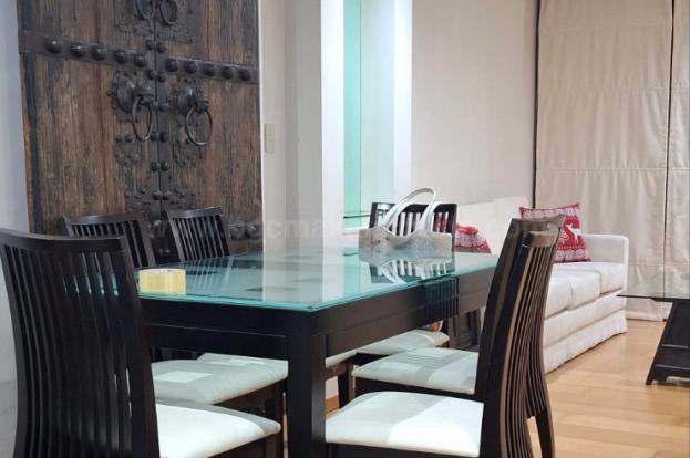 Dining and living areas of 2-bedroom condo unit at Bonifacio Ridge