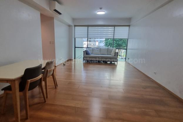 Dining and living areas of 2-bedroom condo unit at Bonifacio Ridge