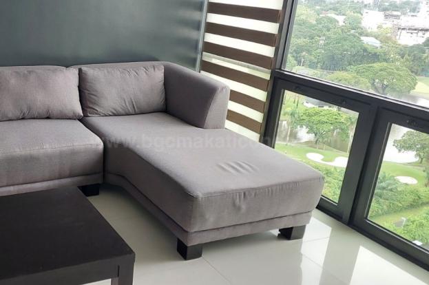 Partial golf course view in the living area of 2-bedroom condo unit at Bonifacio Ridge