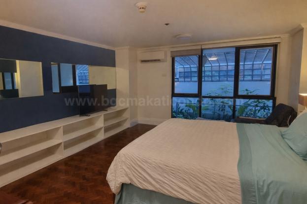 Bedroom 2 of 3-bedroom bi-level condo unit at The Regency at Salcedo