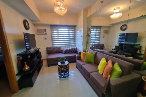 Living area of 1-bedroom condo unit at The Trion Towers tower 1