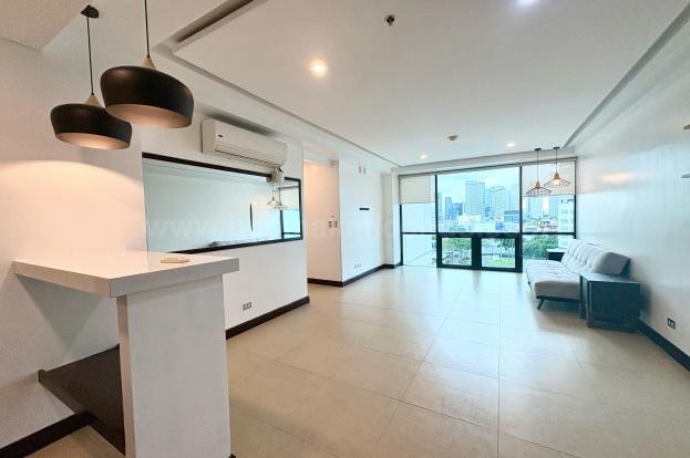 Dining and living areas of 2-bedroom condo unit at Bonifacio Ridge