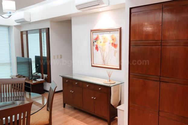 Dining and living areas of 2-bedroom condo unit at Bonifacio Ridge