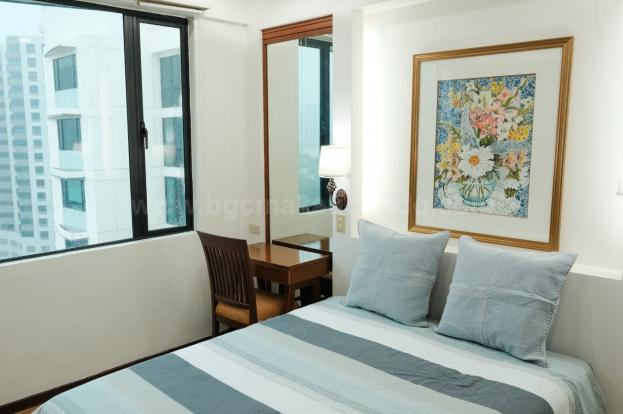 Master bedroom of 2-bedroom condo unit at Bonifacio Ridge