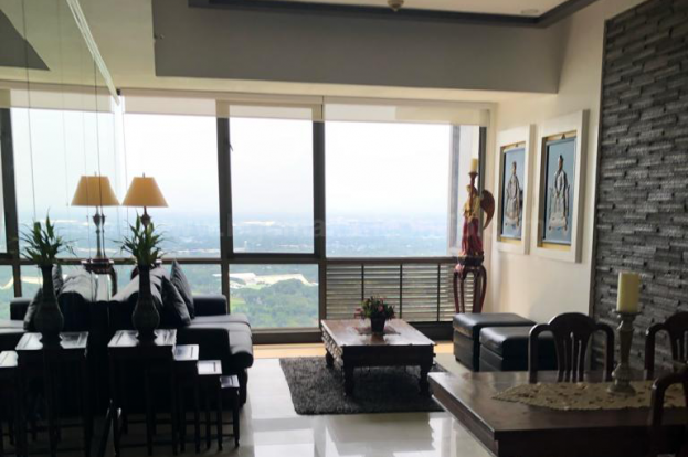 Living area adjoining dining area of three bedroom condominium unit at Bellagio tower 3