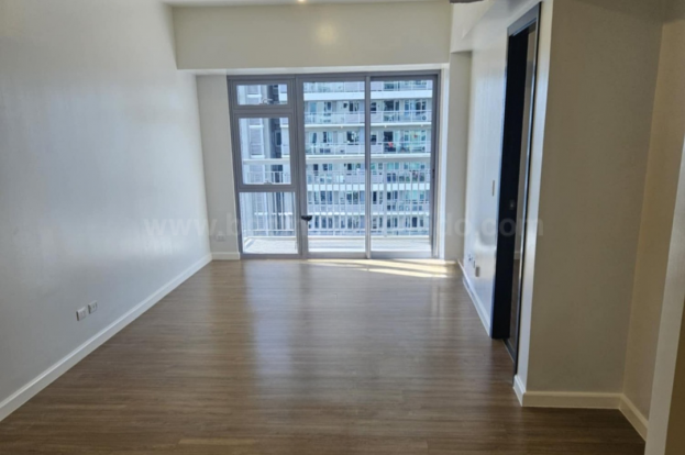 Living area of 1-bedroom condo unit at Park Triangle Residences