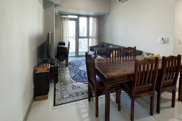 Living and dining area of 2-bedroom unit at Uptown Parksuites tower 2
