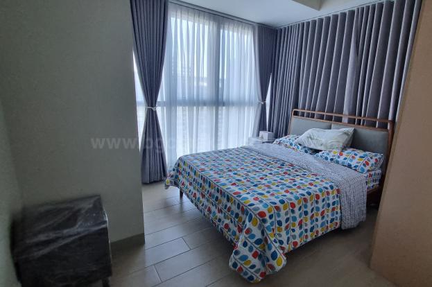 Bedroom of 1-bedroom condo unit at Uptown Parksuites