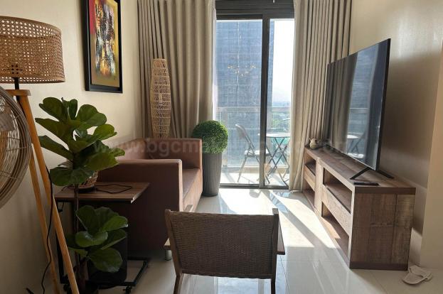 Living area of 2-bedroom condo unit at Uptown Ritz
