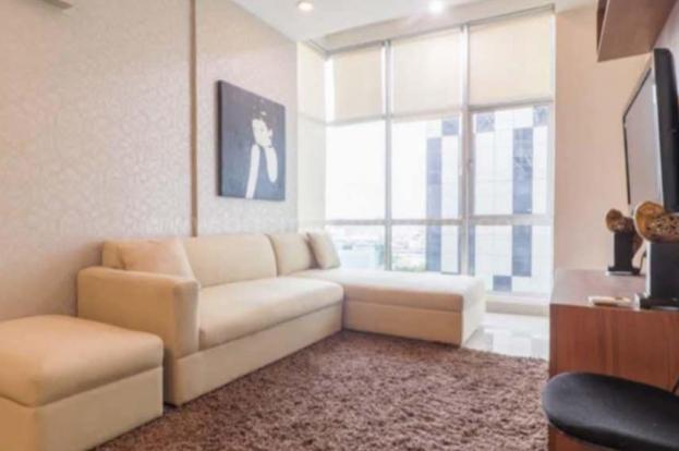 Living area of 2-bedroom condo unit at Sapphire Residences