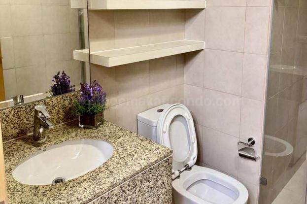 Toillet and bathj of 1-bedroom condo unit at Times Square West