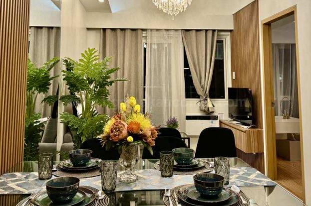 Dining and living areas of 1-bedroom condo unit at Times Square West