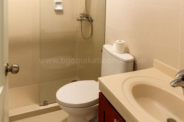 Toilet and bath of 2-bedroom condo unit at Kensington Place